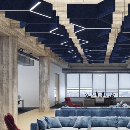 ACOUSTIC SOLUTIONS IN OFFICE BUILDING WITH BLUE CEILING AND BLUE SOFAS