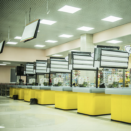 Inside a retail center with yellow booths
